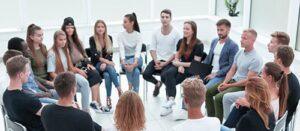 addiction recovery center Andover MA, large group in therapy