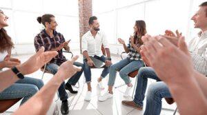 addiction recovery center Keene NH, circle of people sitting in therapy